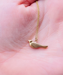 Solid gold bird necklace