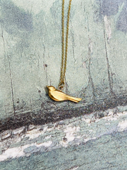 Solid gold bird necklace
