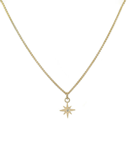 Solid Gold North Star necklace with ethical diamond