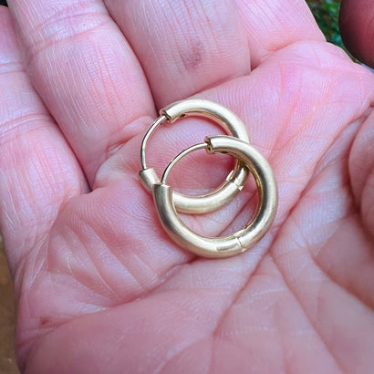 Huggie hoops in solid gold