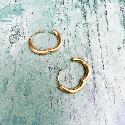 Huggie hoops in solid gold