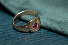 Gold signet ring with Japanese kinko decoration and a rose pink heart shaped ruby in the centre
