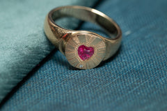 Gold signet ring with Japanese kinko decoration and a rose pink heart shaped ruby in the centre