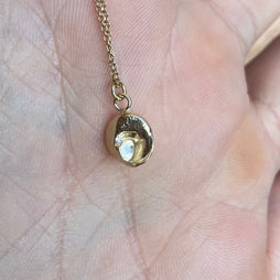 Tiny Gold Snail Shell Pendant