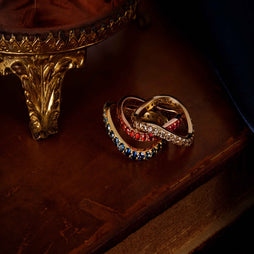 Solid gold eternity wave rings