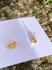 Tiny daffodil stud earrings in solid gold